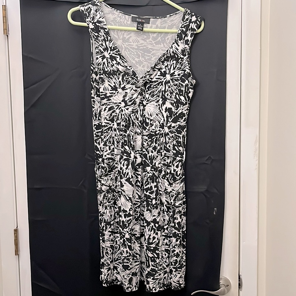 Lightweight summer dress for the beach. Sleeveless with front pockets.